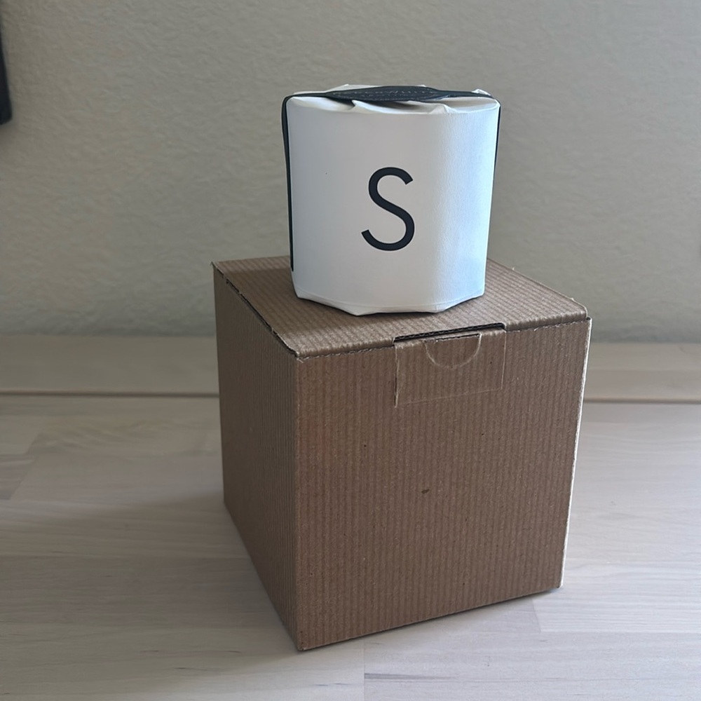 Pottery Barn Paperwhite scented “S” glass votive candle